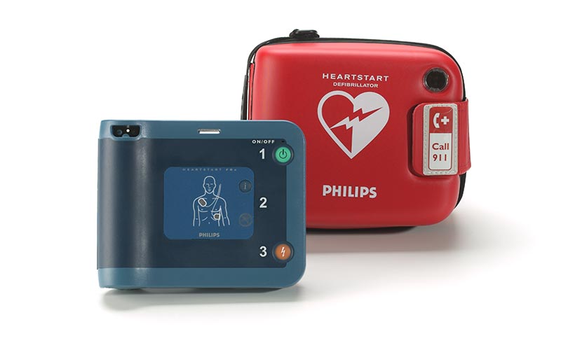 Philips HeartStart defibrillator with red carrying case