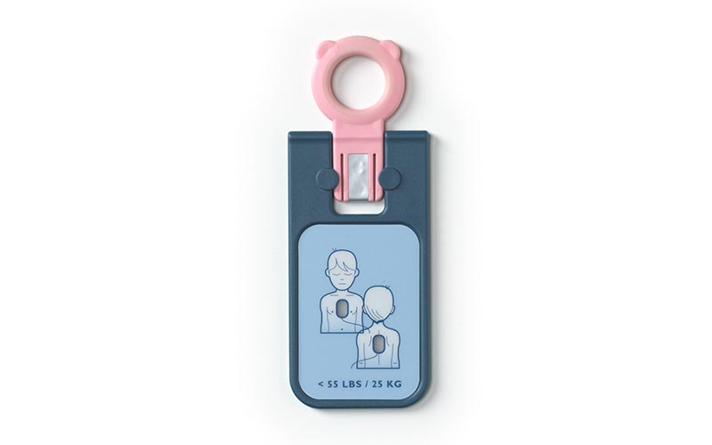 Pediatric AED pad cartridge with placement diagram