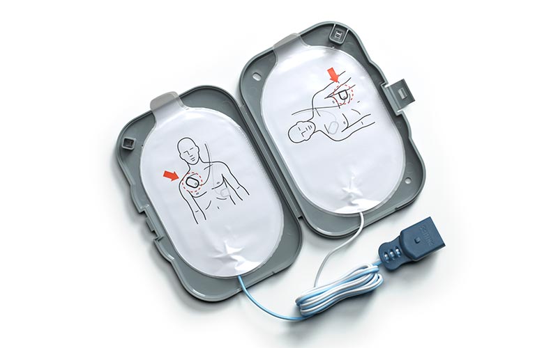 Automated external defibrillator with electrode pad placement diagrams