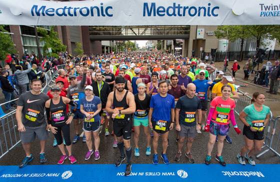 Crowd of runners at marathon starting line