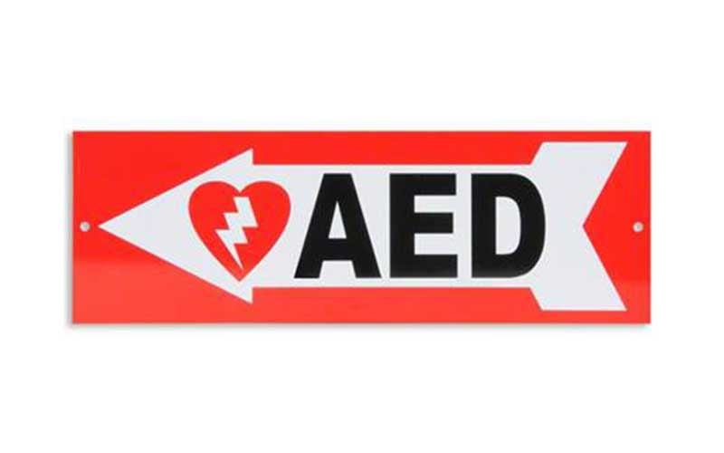 Red AED sign with left arrow and heart symbol