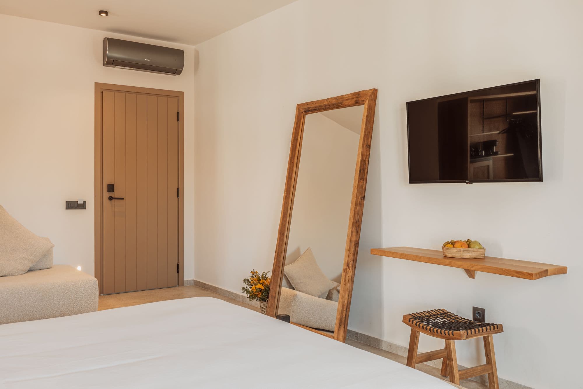 Elegant interior of Aelo Mykonos showcasing contemporary design and amenities.