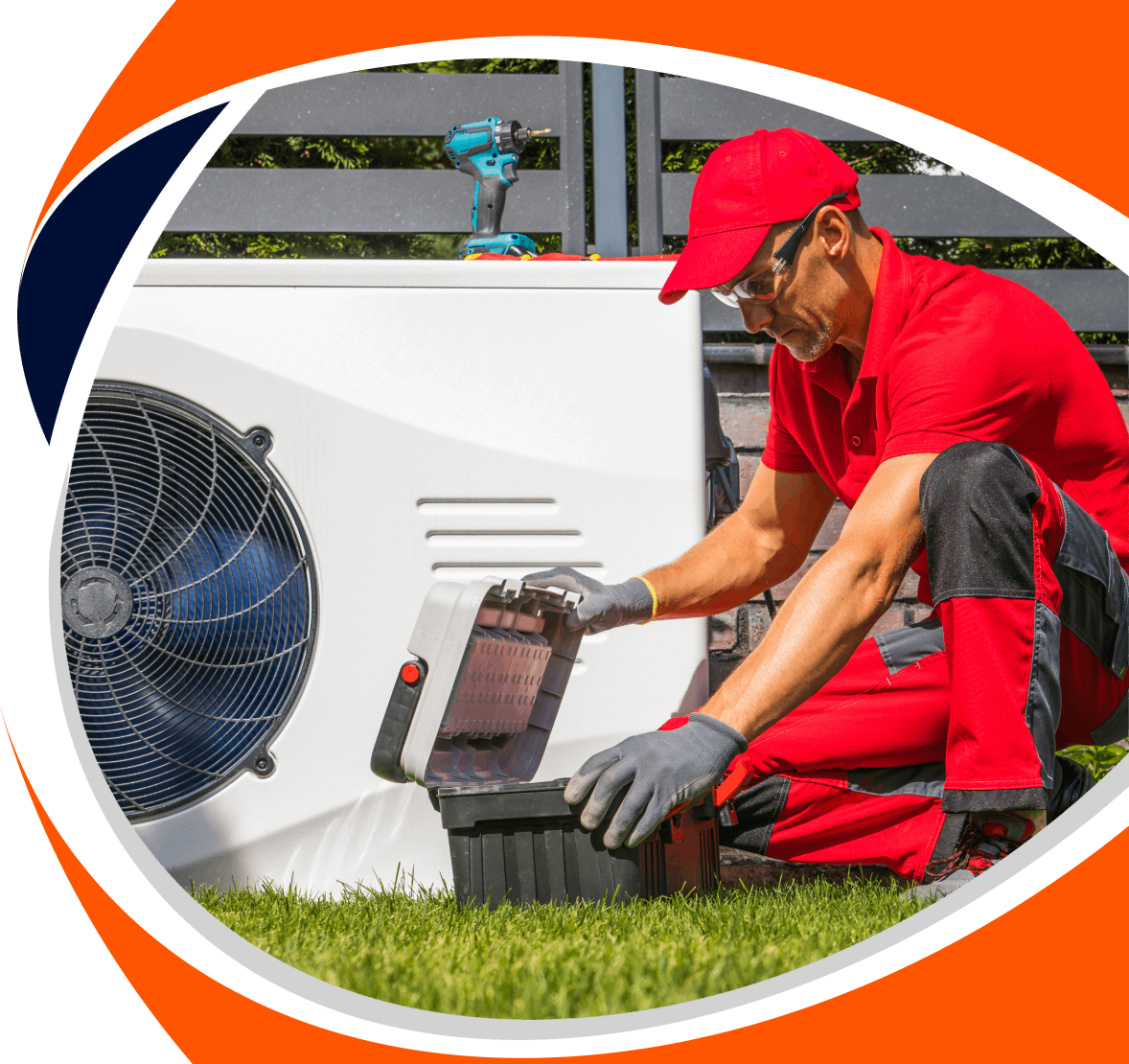 Man in red uniform inspecting an outdoor air conditioning unit on green grass