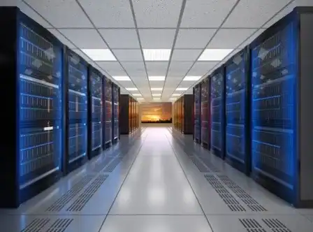 Modern server room with blue-lit racks and cooling systems for IT infrastructure.