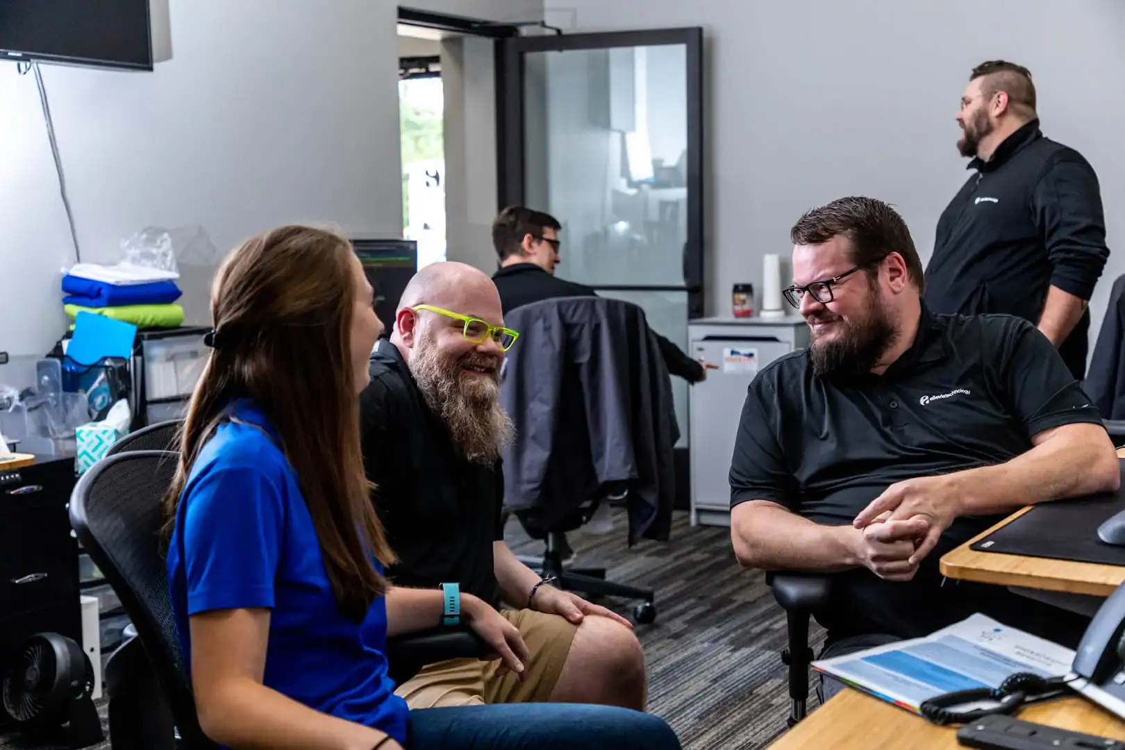 Team meeting at Allevia Technology office for payments solutions.