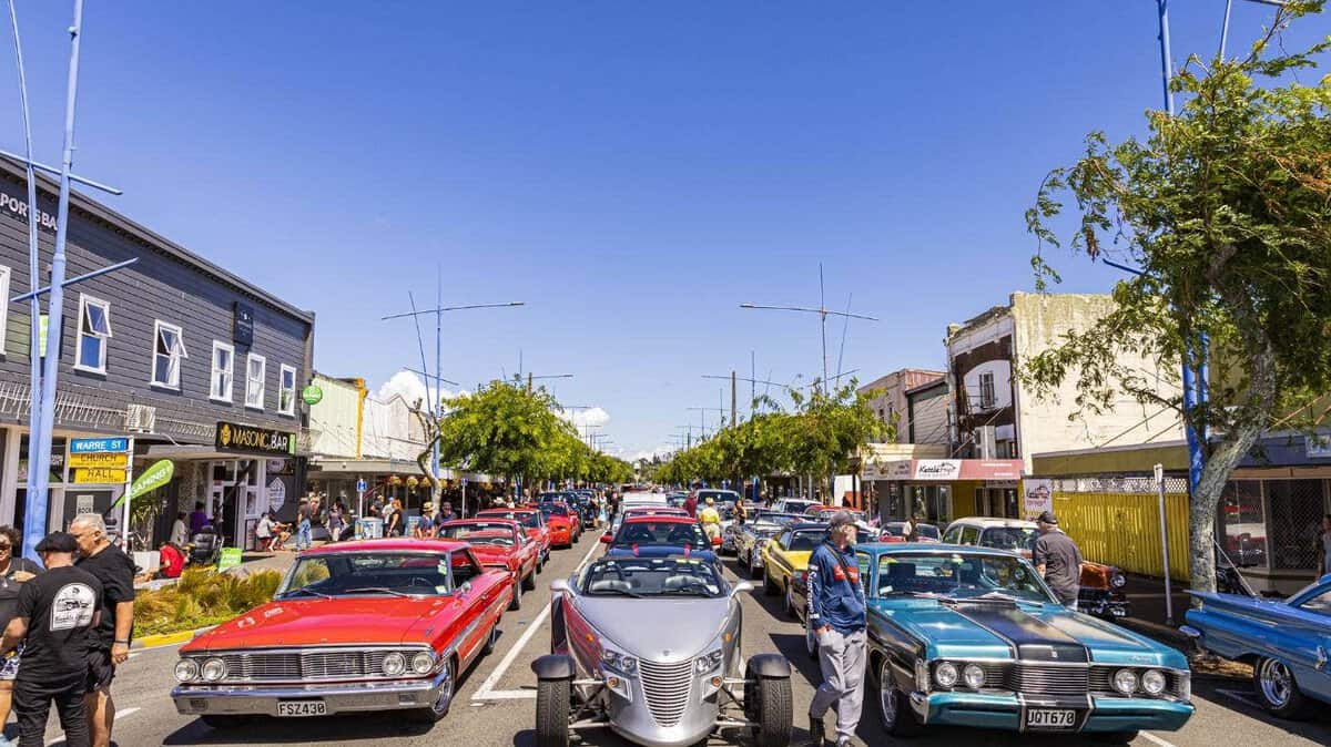 Classic American cars at a car show in New Zealand.
