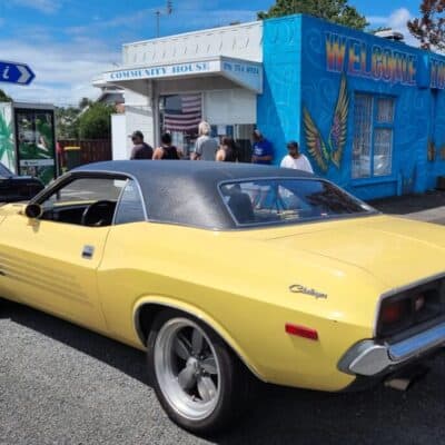 Classic yellow Dodge Challenger at American car show in New Zealand.