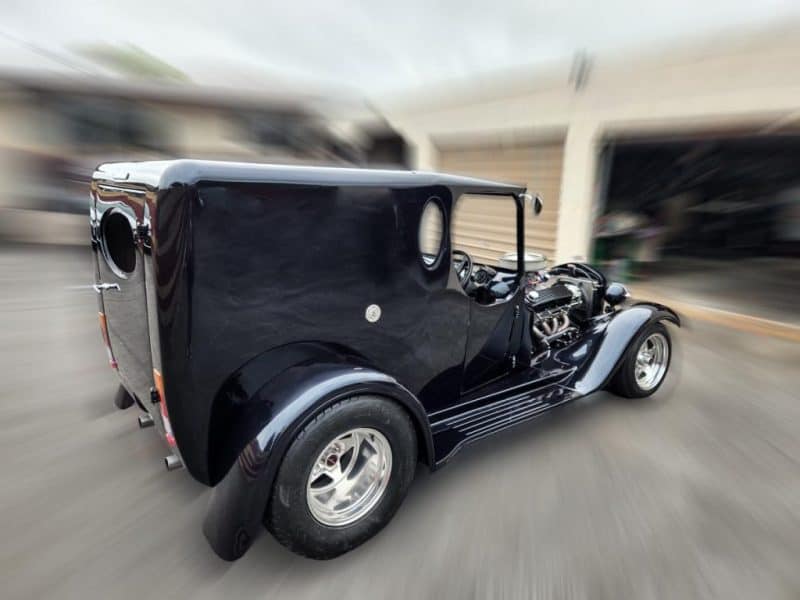 Vintage black custom hot rod car at Americarna event NZ.