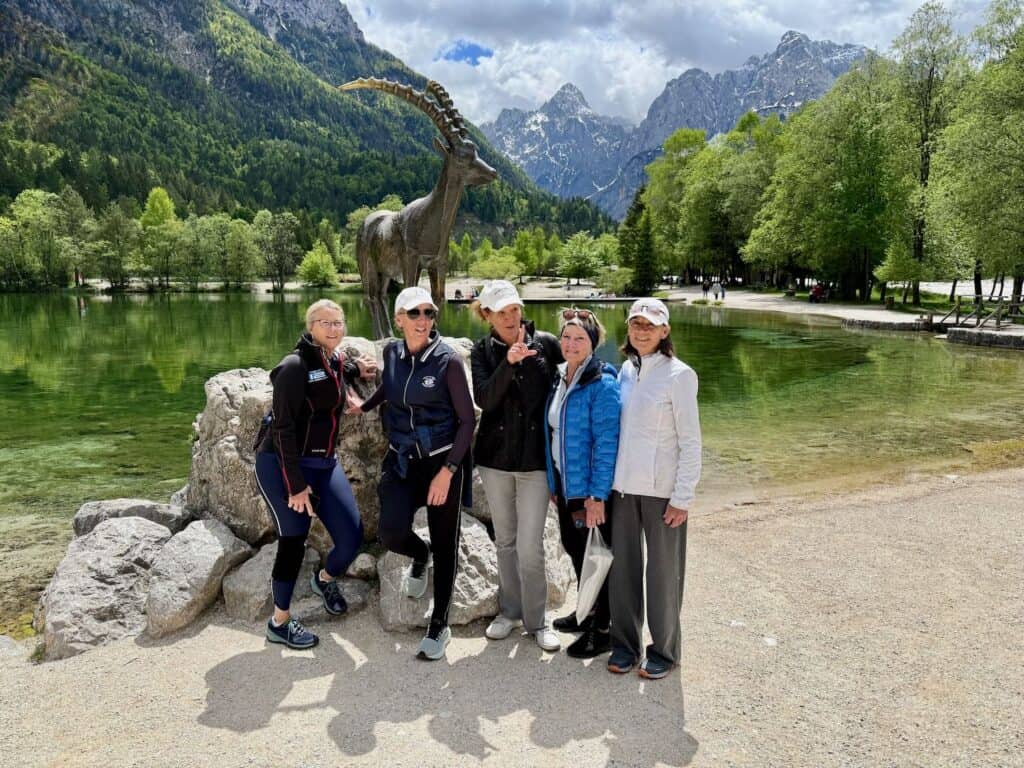 a group of women traveling in the mountains
