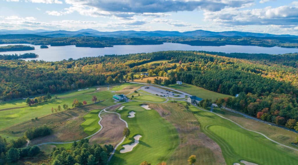 Scenic golf course with autumn foliage.