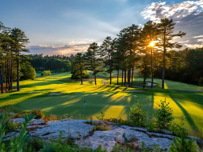 Sunset over a lush golf course