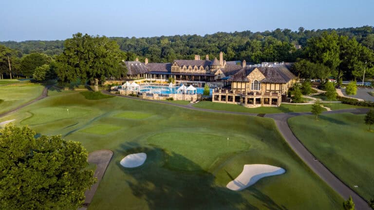 Elegant golf course with clubhouse and pool