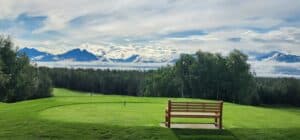 Scenic view with bench and mountains
