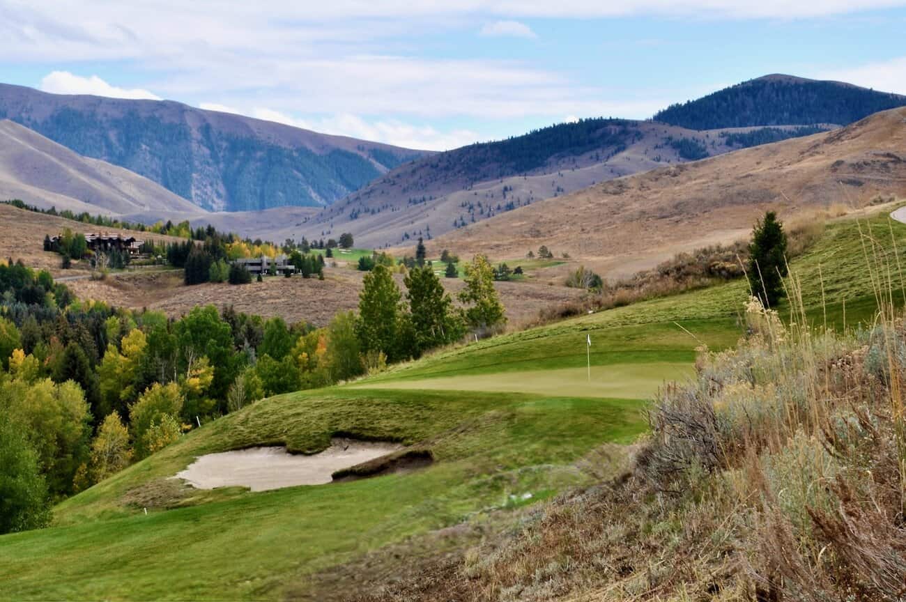 Golf course with mountainous backdrop