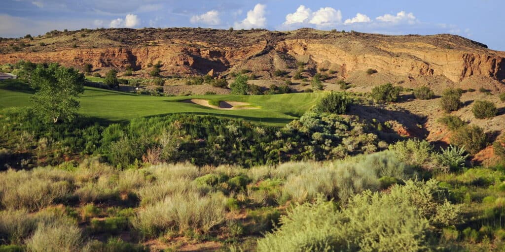 Lush golf course in desert landscape