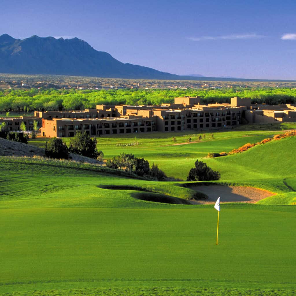 Scenic golf course with mountains backdrop