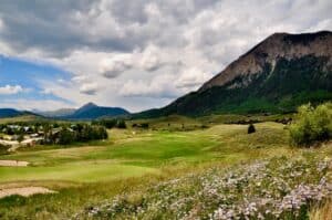Scenic golf course with mountains backdrop