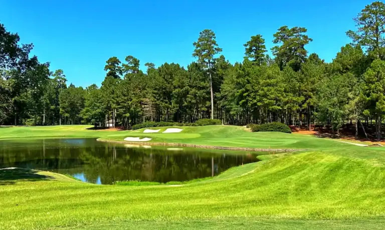 Lush golf course with serene pond