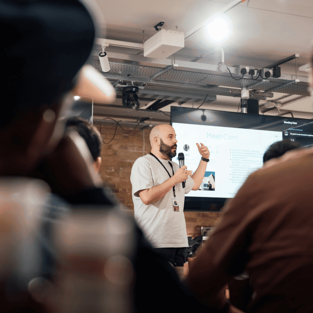 Speaker presenting to an audience during a community event