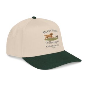 Beige cap with green brim and dog logo