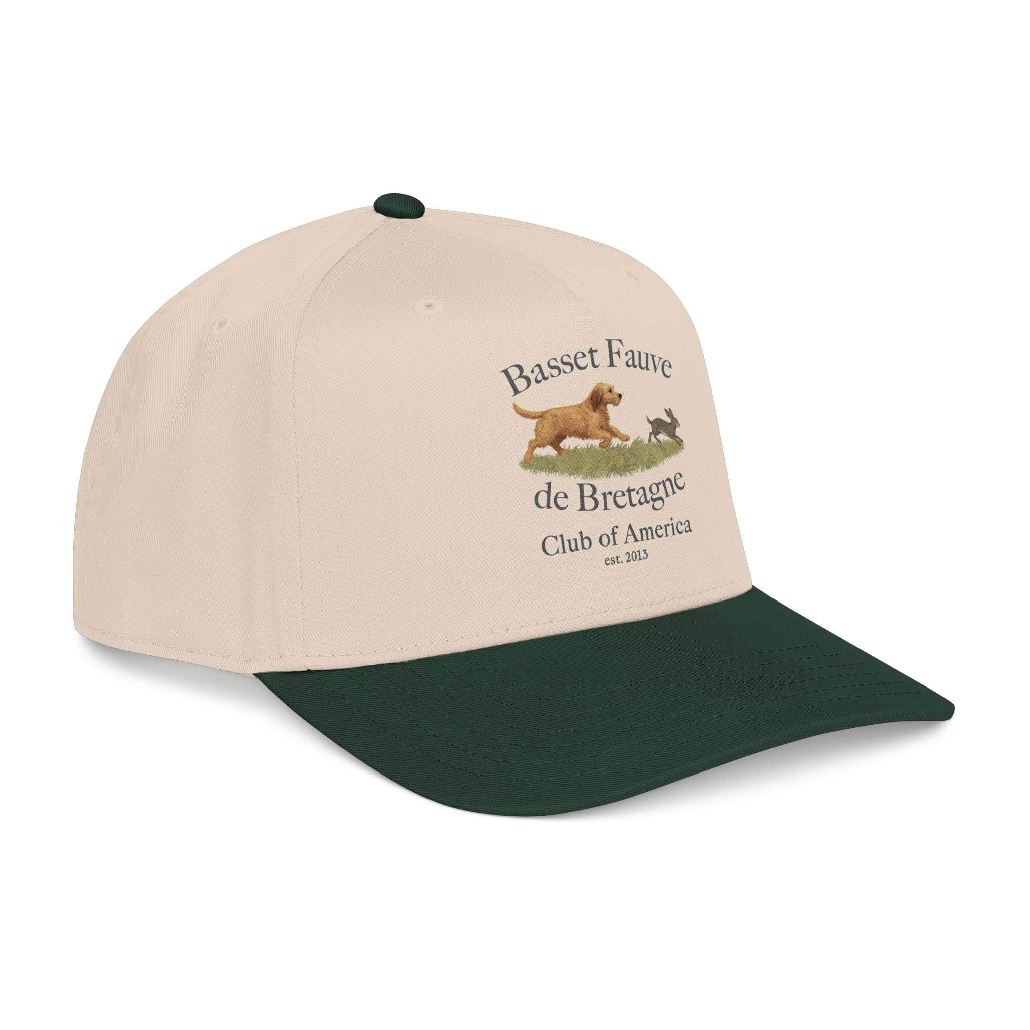 Beige cap with green brim and dog logo