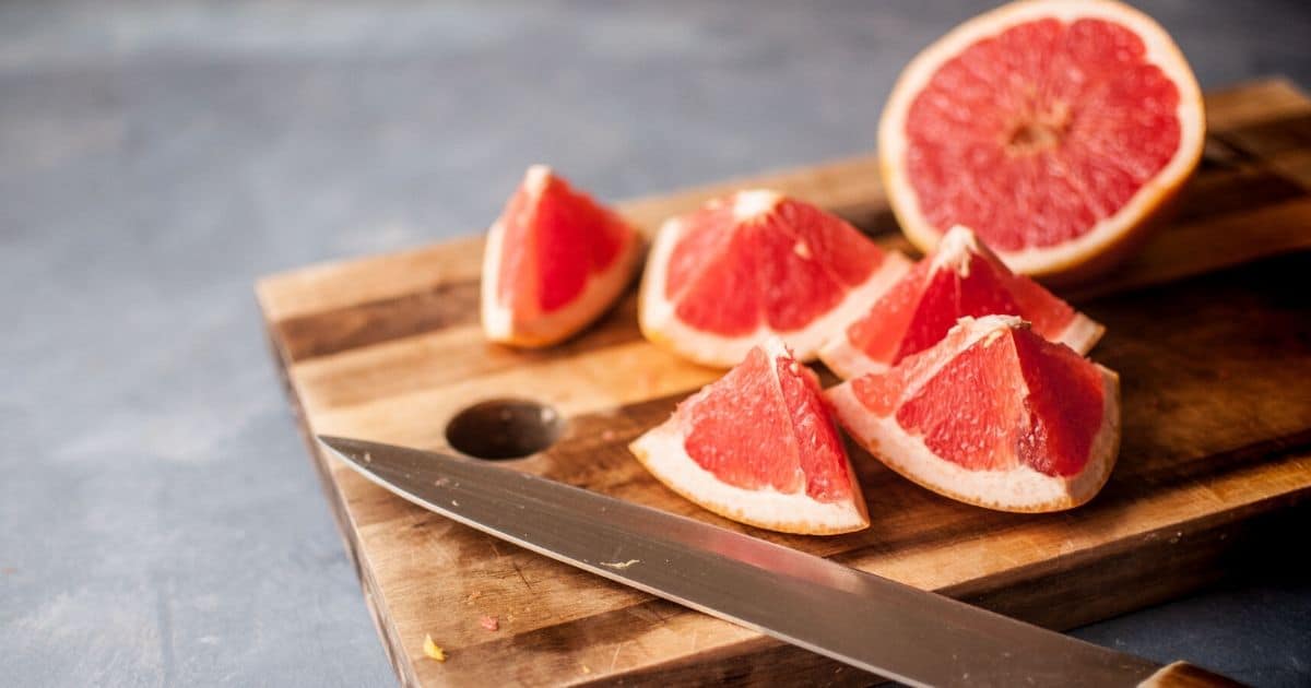 Cut grapefruit on a cutting board