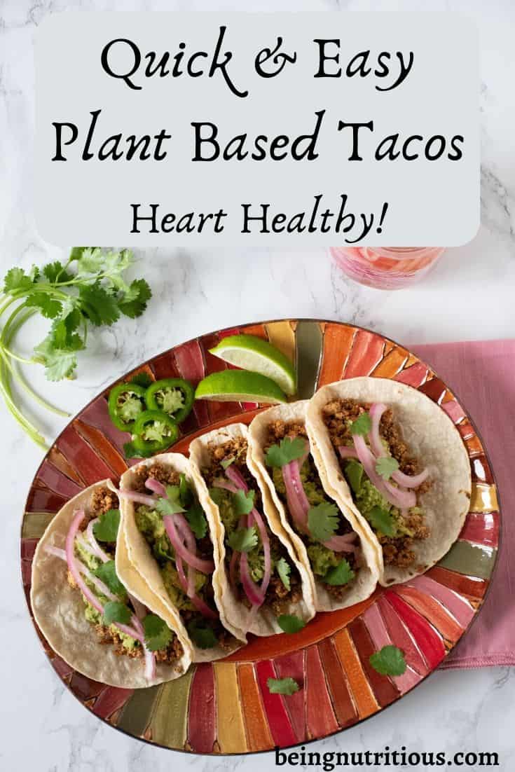 Overhead image of 5 tacos lined up on a plate. Text overlay: Quick and easy plant based tacos; heart healthy