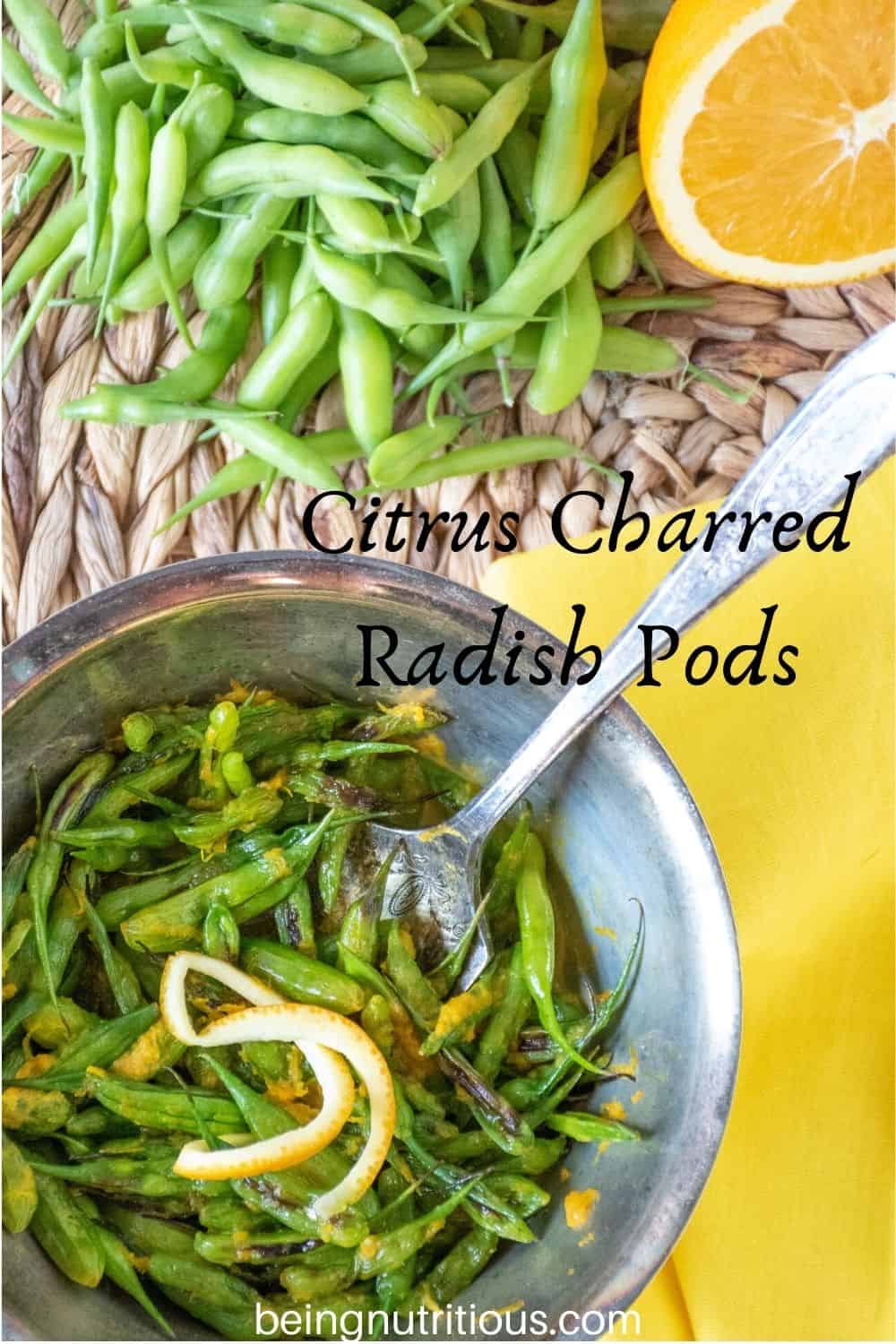Overhead shot of silver bowl of charred radish pods with silver fork. Fresh pods and sliced orange visible with text overlay: "Citrus Charred Radish Pods"