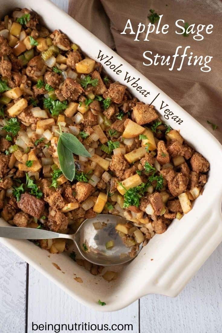 Large casserole dish with stuffing, and a spoon. Text overlay: Apple Sage Stuffing, whole wheat, vegan.