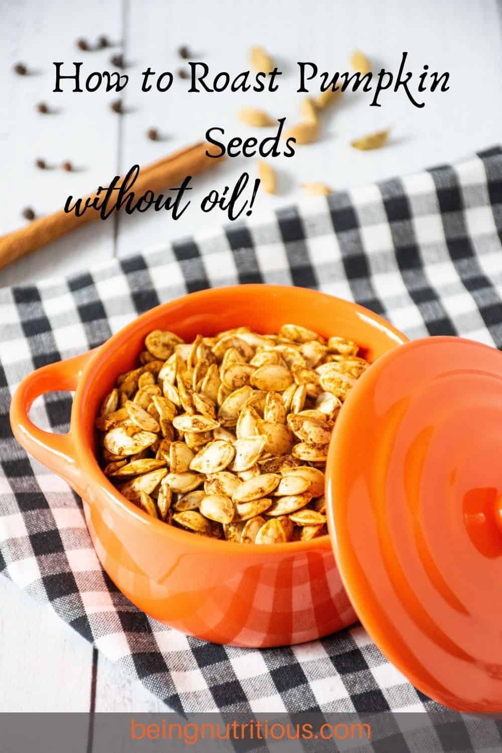 Small pot filled with roasted pumpkin seeds. Text overlay: How to roast pumpkin seeds without oil