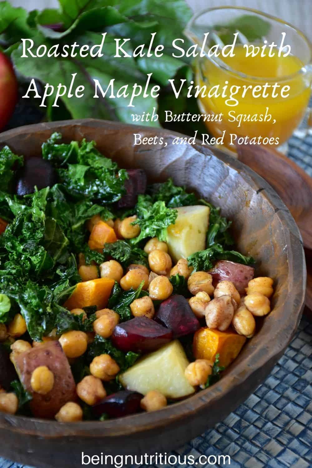 Kale salad in a wooden bowl. Text overlay: Roasted Kale Salad with Apple Maple Vinaigrette, with butternut squash, beets, and red potatoes.