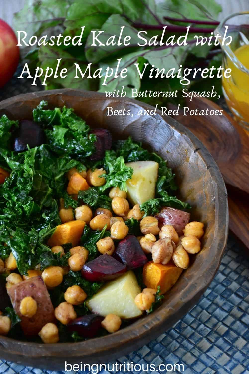 Kale salad in a wooden bowl. Text overlay: Roasted Kale Salad with Apple Maple Vinaigrette, with butternut squash, beets, and red potatoes.