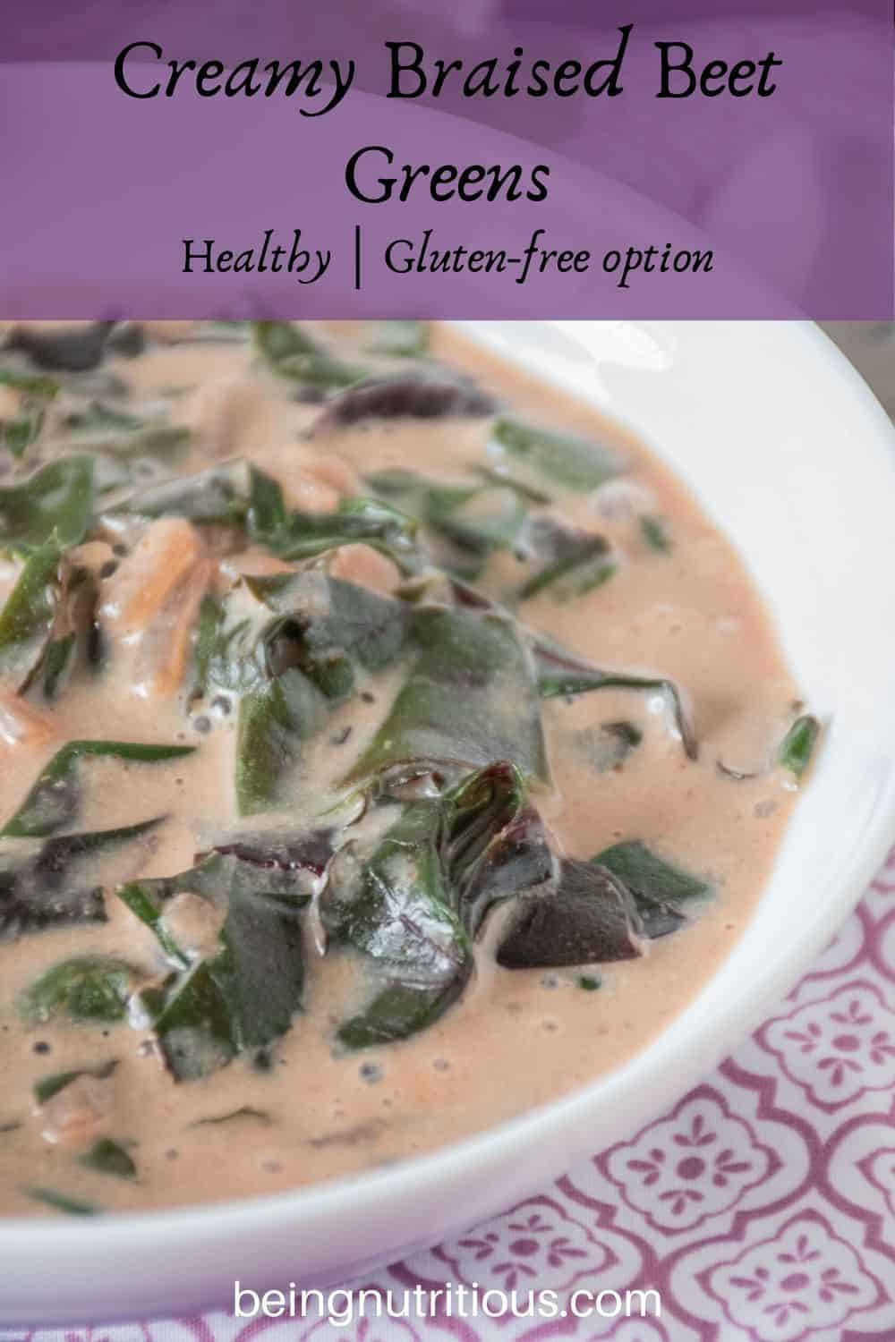 Close up of a bowl of braised greens in a light pink broth. Text overlay: Creamy Braised Beet Greens; healthy, gluten-free option.