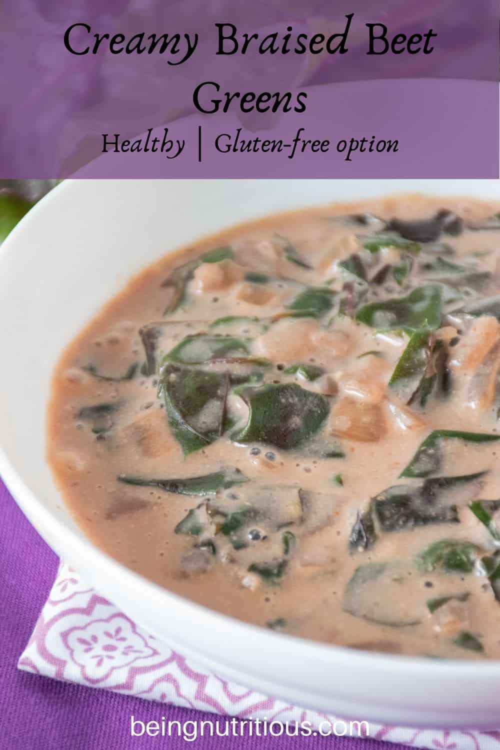 Close up of a bowl of braised greens in a light pink broth. Text overlay: Creamy Braised Beet Greens; healthy, gluten-free option.