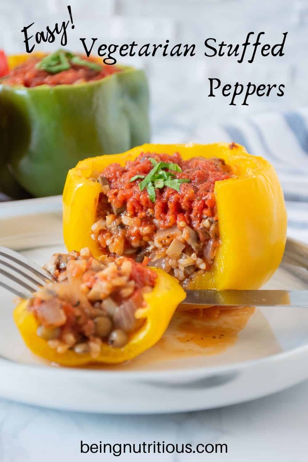 A yellow stuffed pepper, side cut open to reveal stuffing, on a plate. Text overlay: Easy! Vegetarian Stuffed peppers.