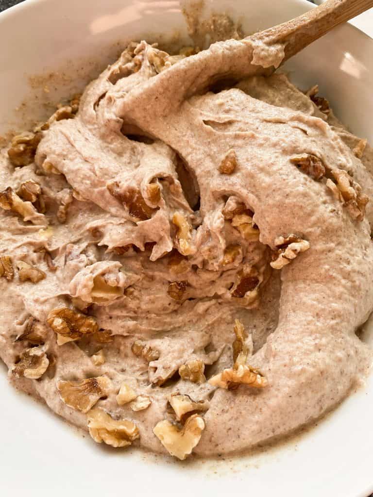 Nice cream in bowl with nuts