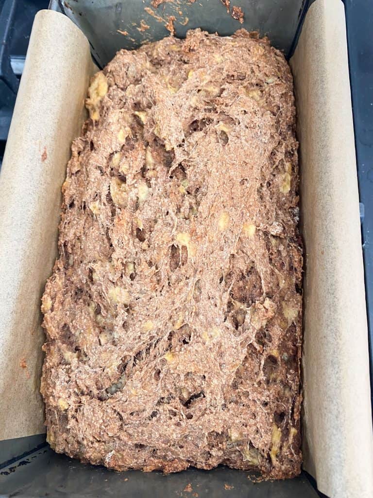 Baked banana bread in loaf pan.