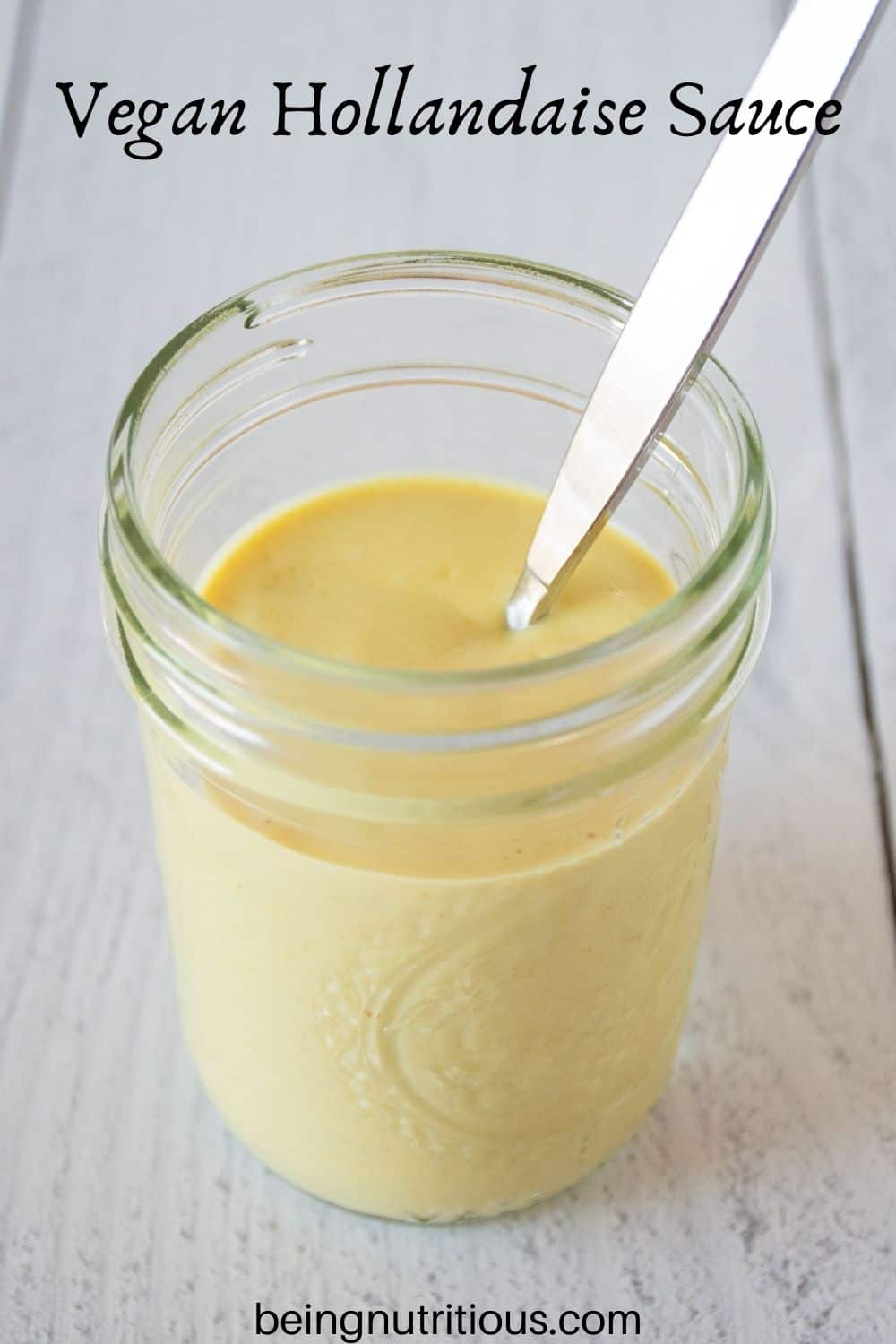 Jar of sauce. Text overlay: Vegan Hollandaise Sauce
