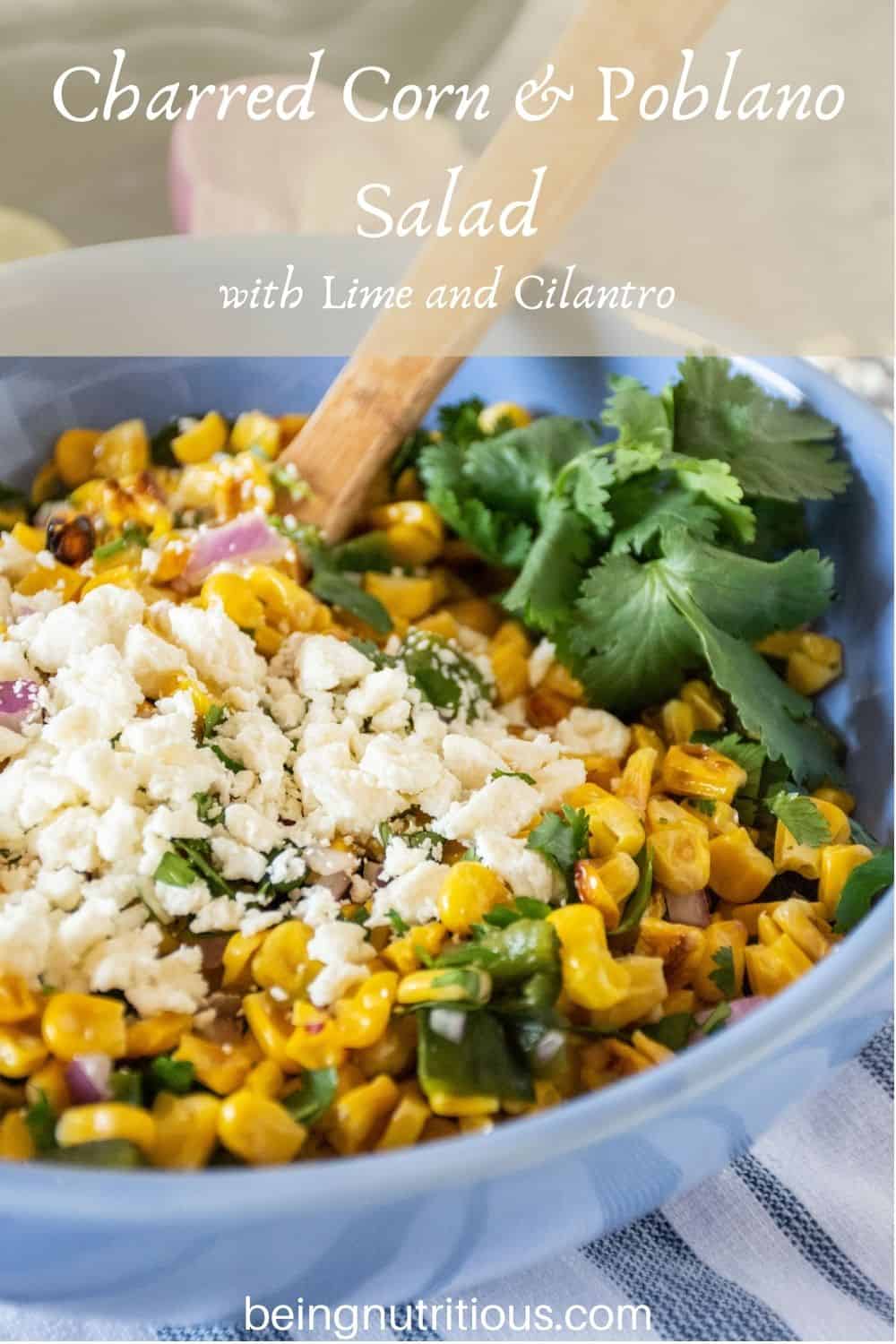 Corn salad in a bowl. Text overlay: Charred Corn & Poblano Salad with Lime and Cilantro.