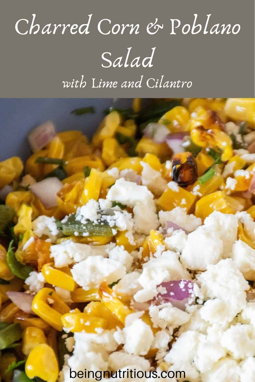 Close up of corn salad. Text overlay: Charred Corn & Poblano Salad with Lime and Cilantro.