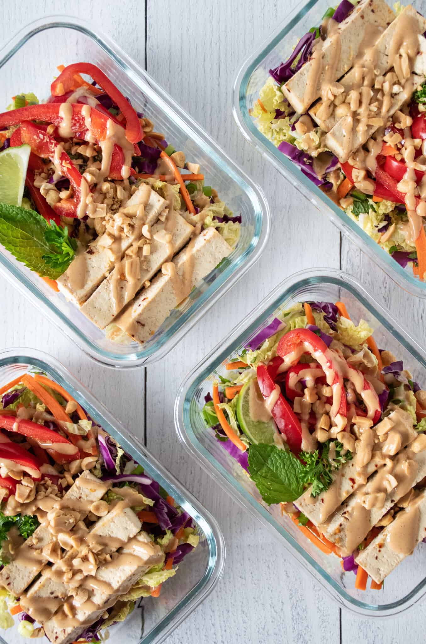Overhead picture of Thai salad in meal prep containers.