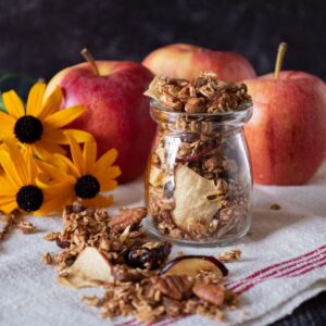 Small jar with granola in it.