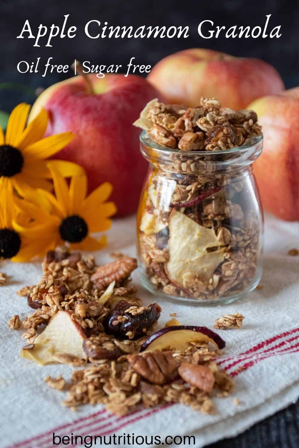Small jar with granola in it. Text overlay: Apple Cinnamon Granola; oil free, sugar free.