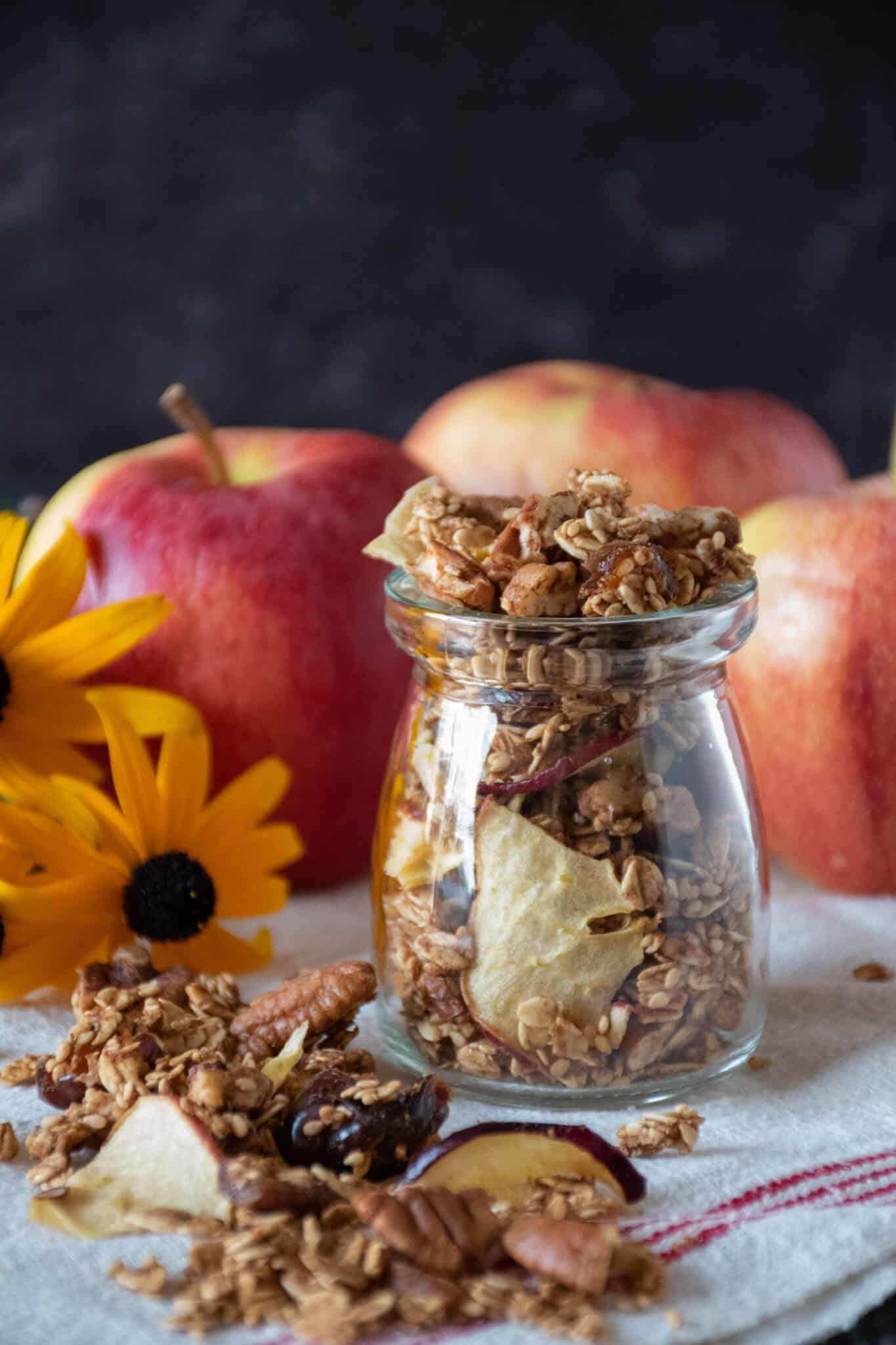 Small jar with granola in it.