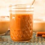 Small jar of pumpkin spice syrup.