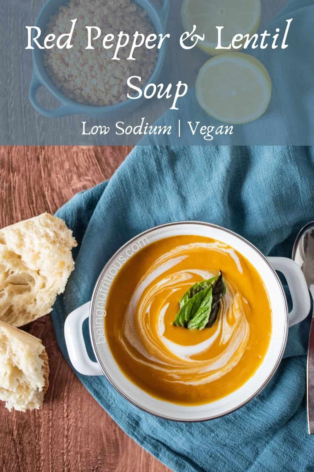 Small crock of creamy soup, garnished with basil leaves. Text overlay: Red Pepper and Lentil Soup, low sodium, vegan.