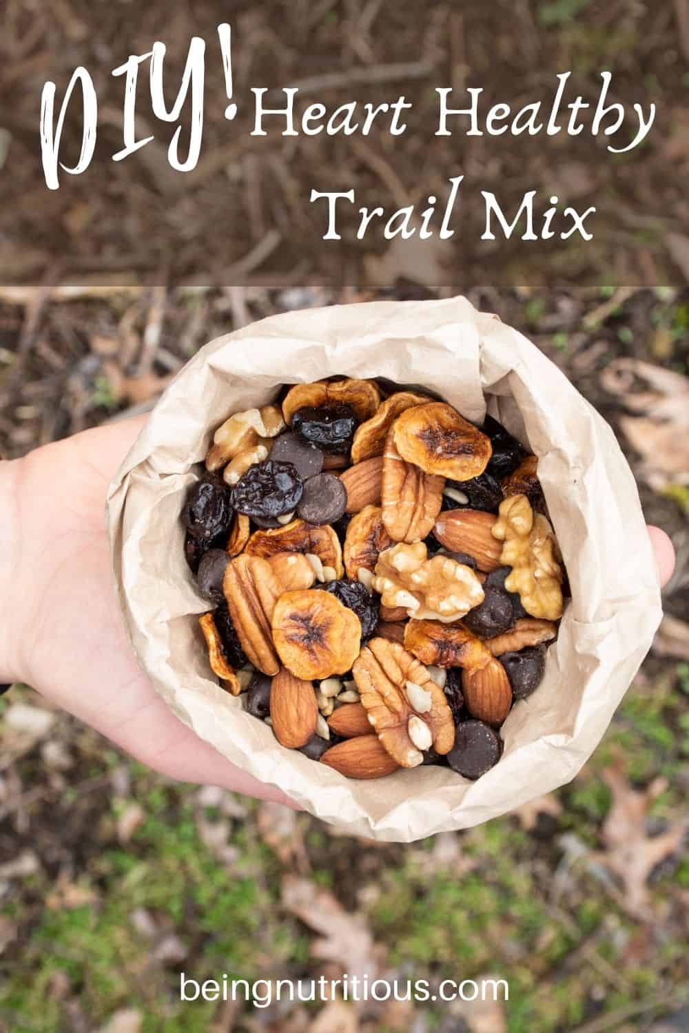 Paper bag filled with trail mix. Text overlay: DIY Heart Healthy Trail Mix
