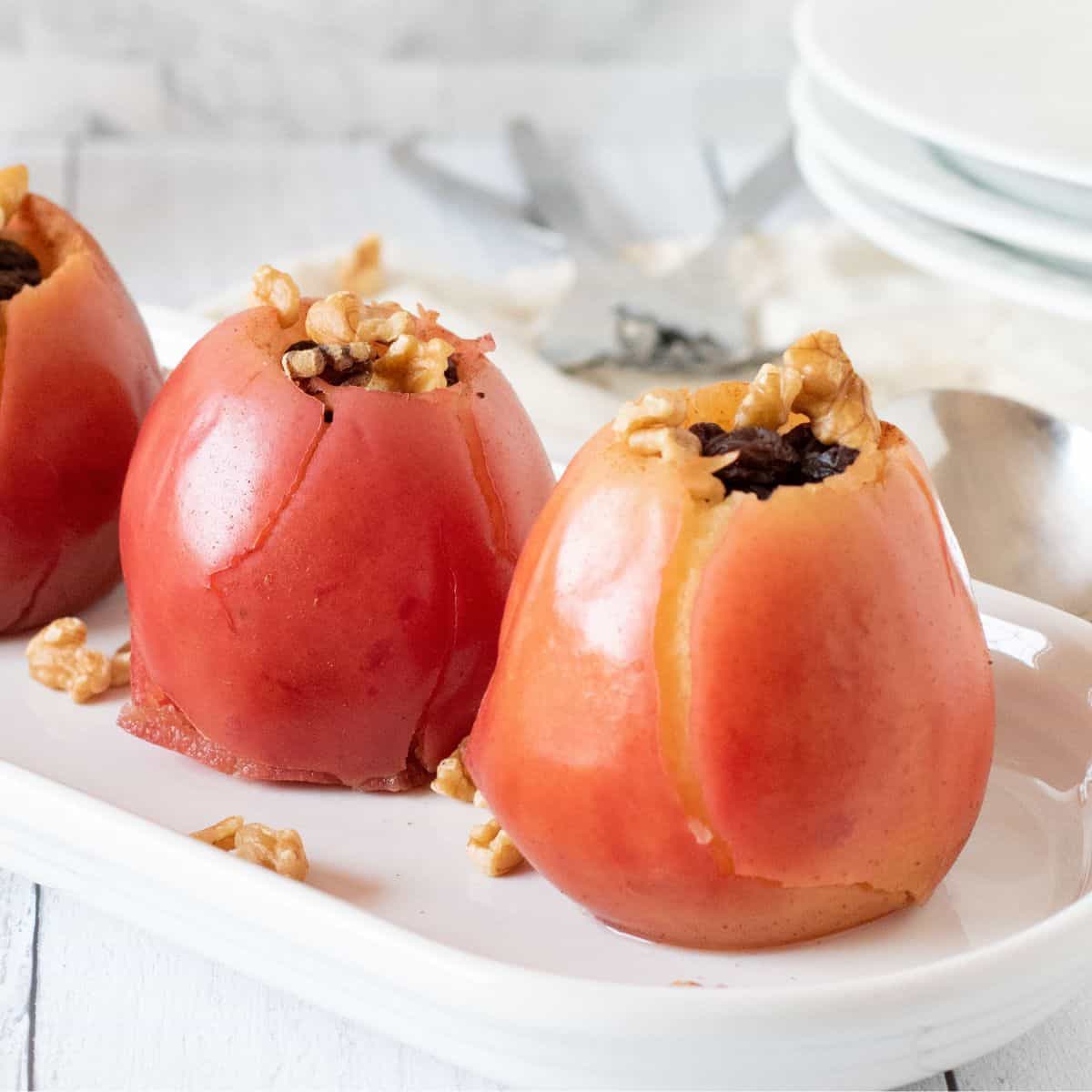 Baked apples on a plate.