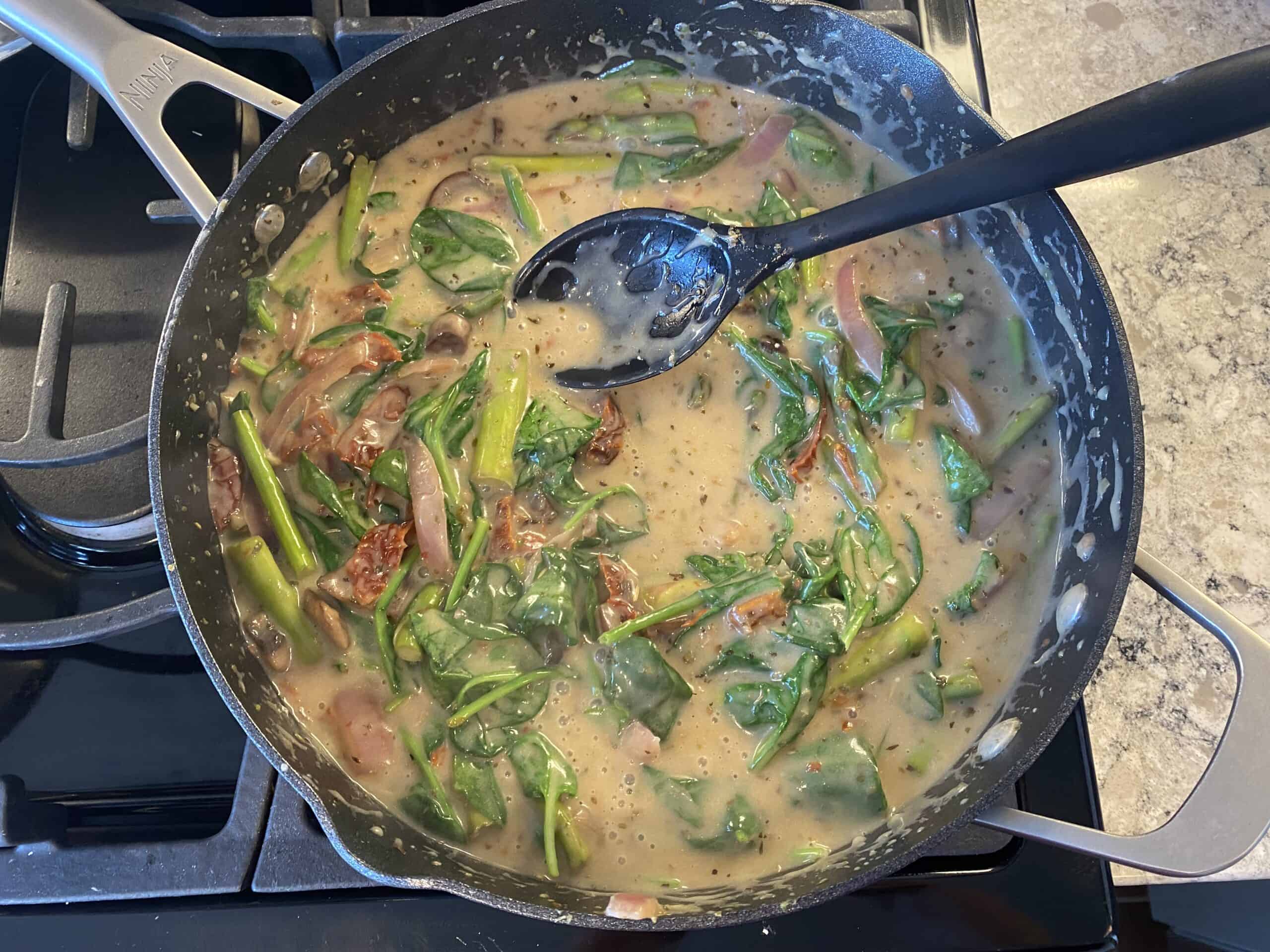 Spinach in creamy sauce.
