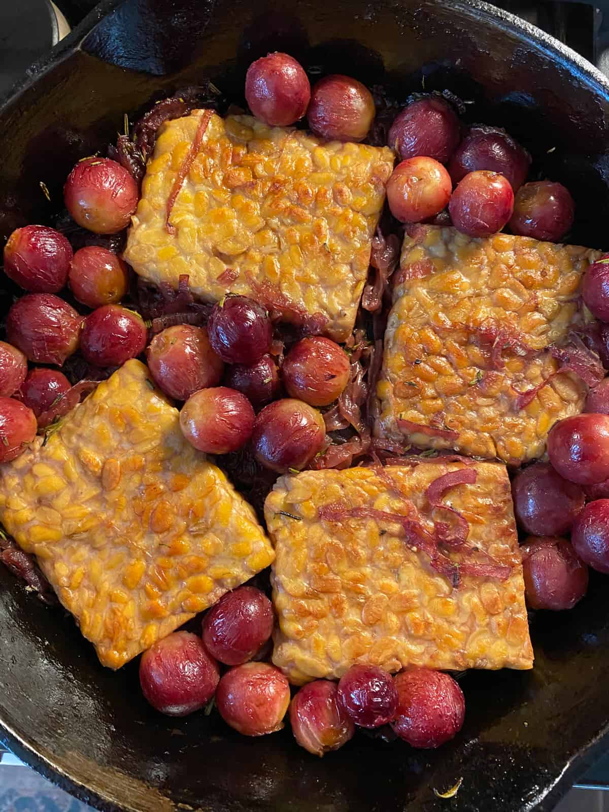 Finished tempeh recipes in a skillet.